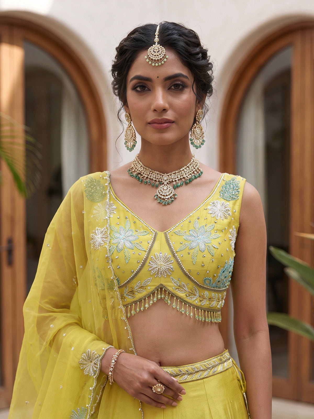 Yellow raw silk embroidered haldi lehenga attire