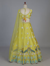 Yellow raw silk embroidered haldi lehenga attire