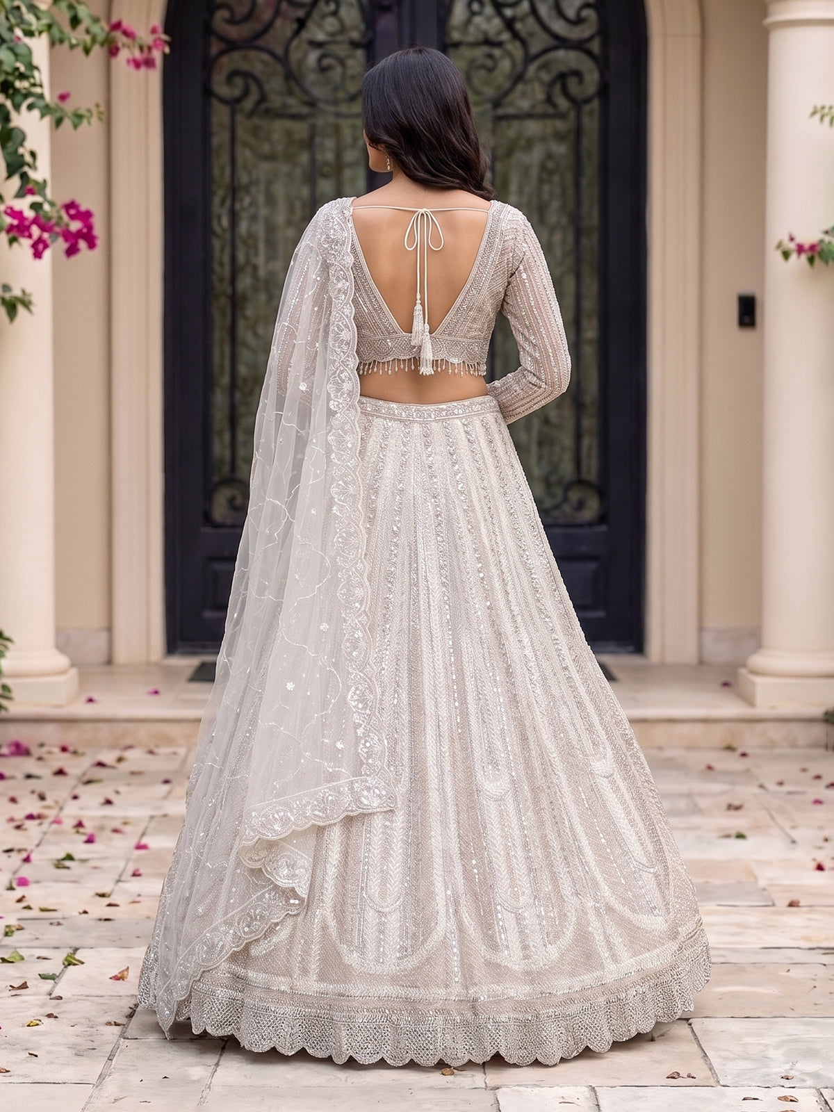 White net designer lehenga choli with embellished dupatta