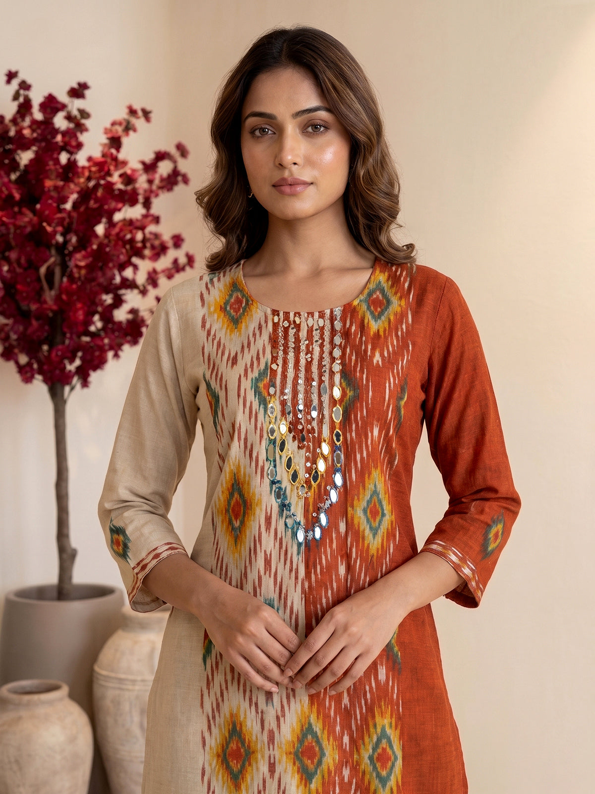 Rust orange silk printed palazzo set with pearl and aabla detailing