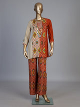 Rust orange silk printed palazzo set with pearl and aabla detailing