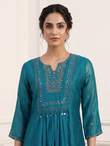 Teal blue tissue yoke kurti set with intricate festive detailing