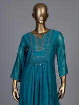 Teal blue tissue yoke kurti set with intricate festive detailing