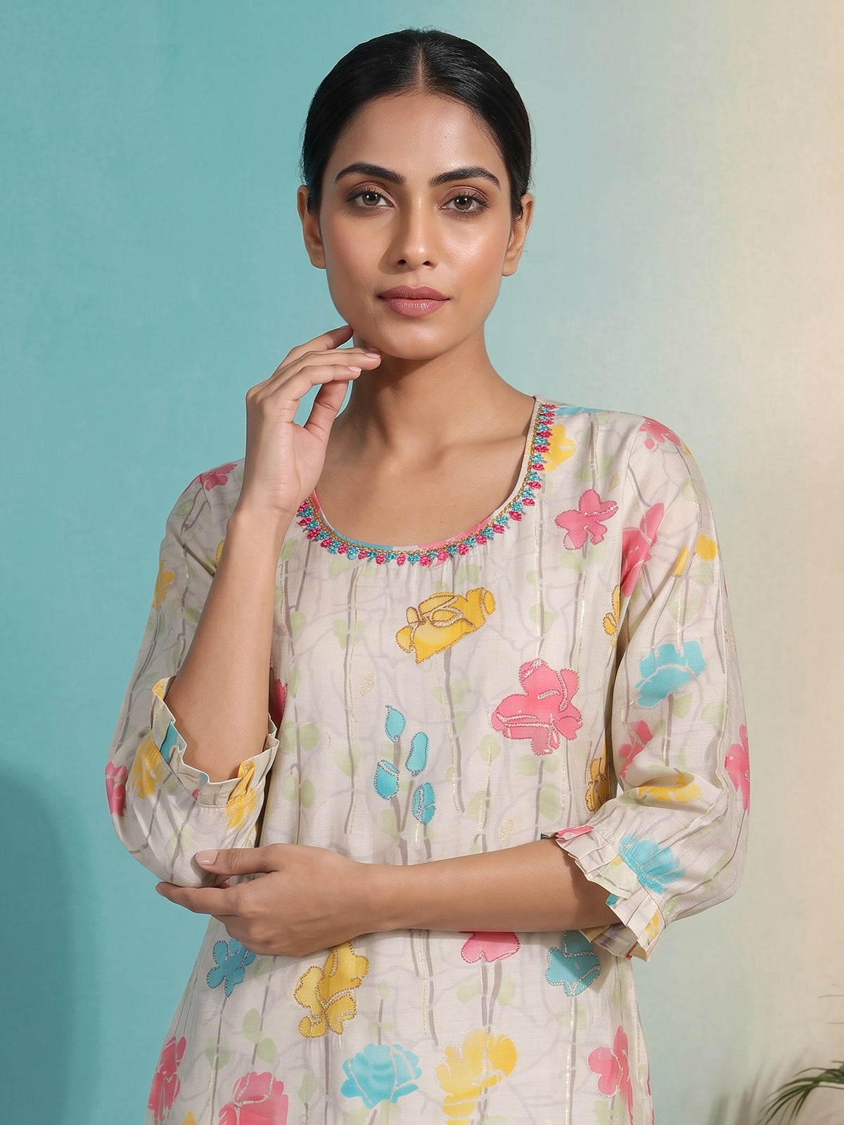 Cream silk floral printed kurti with graceful zari and aabla detailing