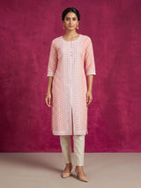 Peach chikan kurti with embroidery and elegant round neckline