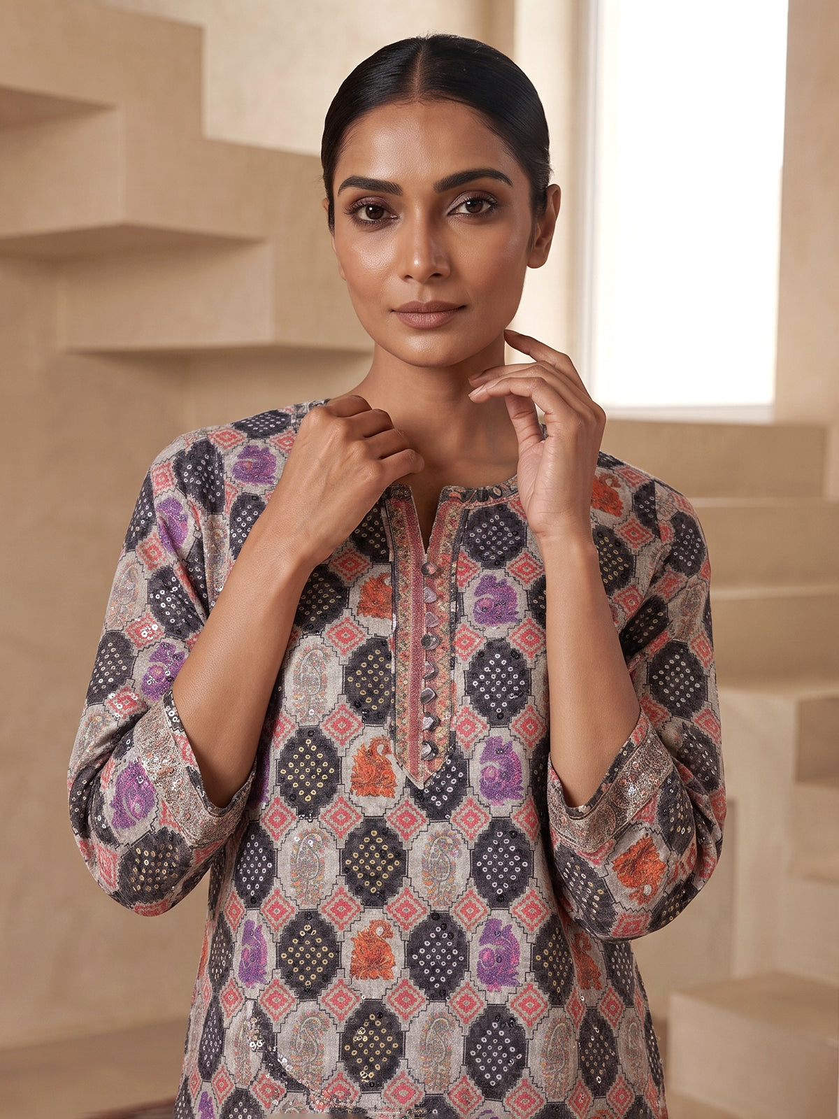 Grey chikan printed kurti with delicate sequins and quarter sleeves