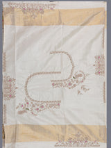Cream patola silk saree with peacock motif contrast border and pallu