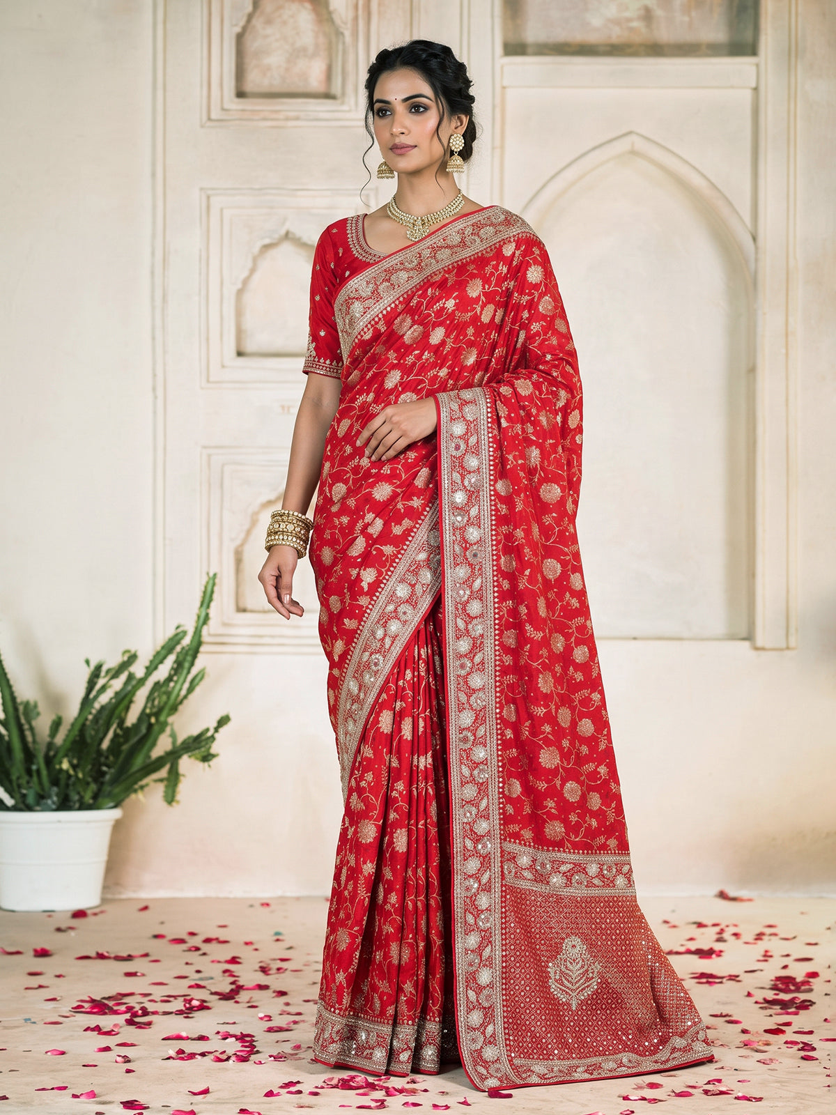 Red dola silk saree with floral zardosi and pearl zari work