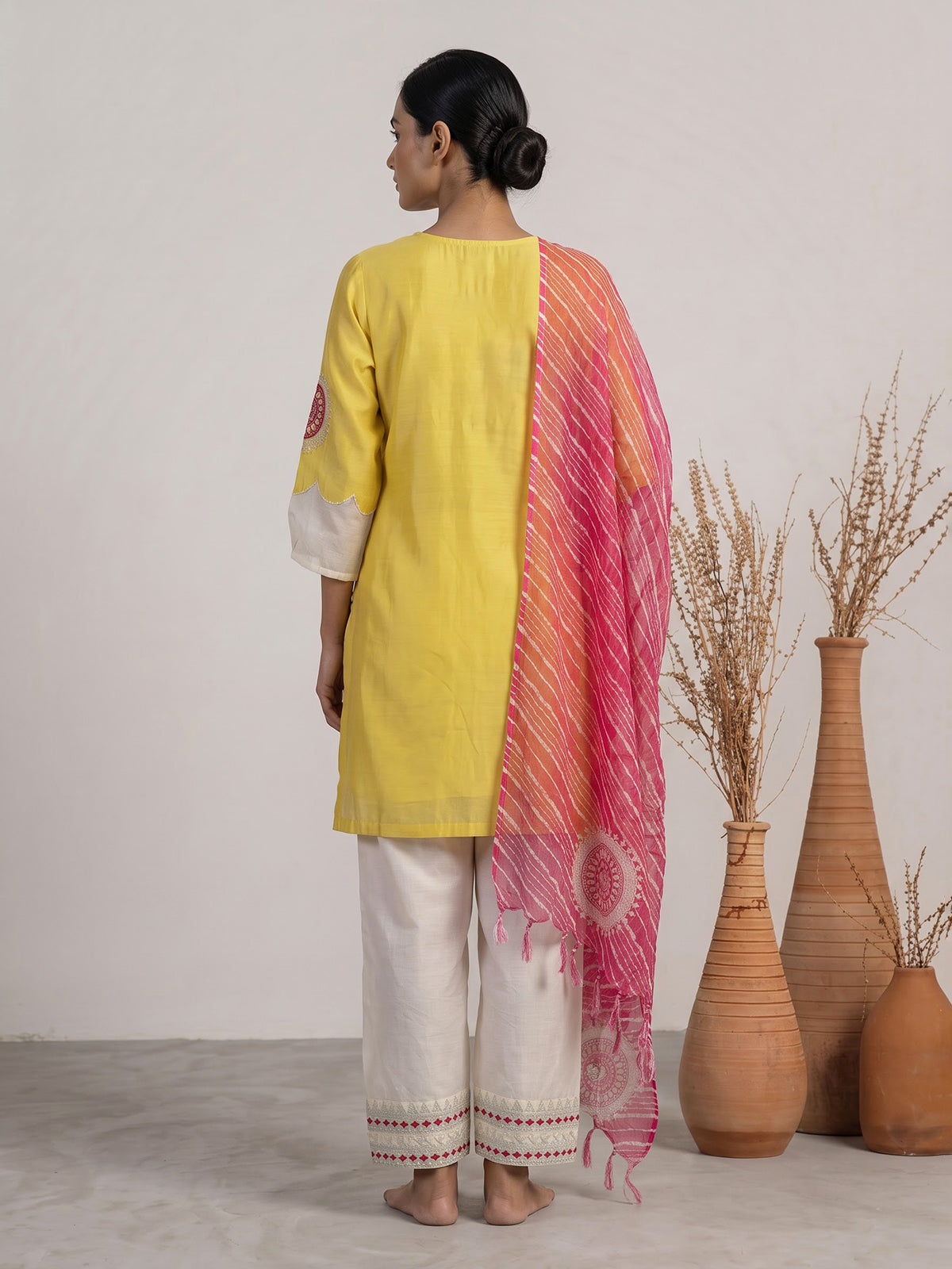 Yellow tissue salwar suit with thread and bead detailing