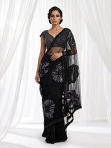 Black net designer saree with floral sequin embellishments