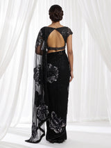 Black net designer saree with floral sequin embellishments