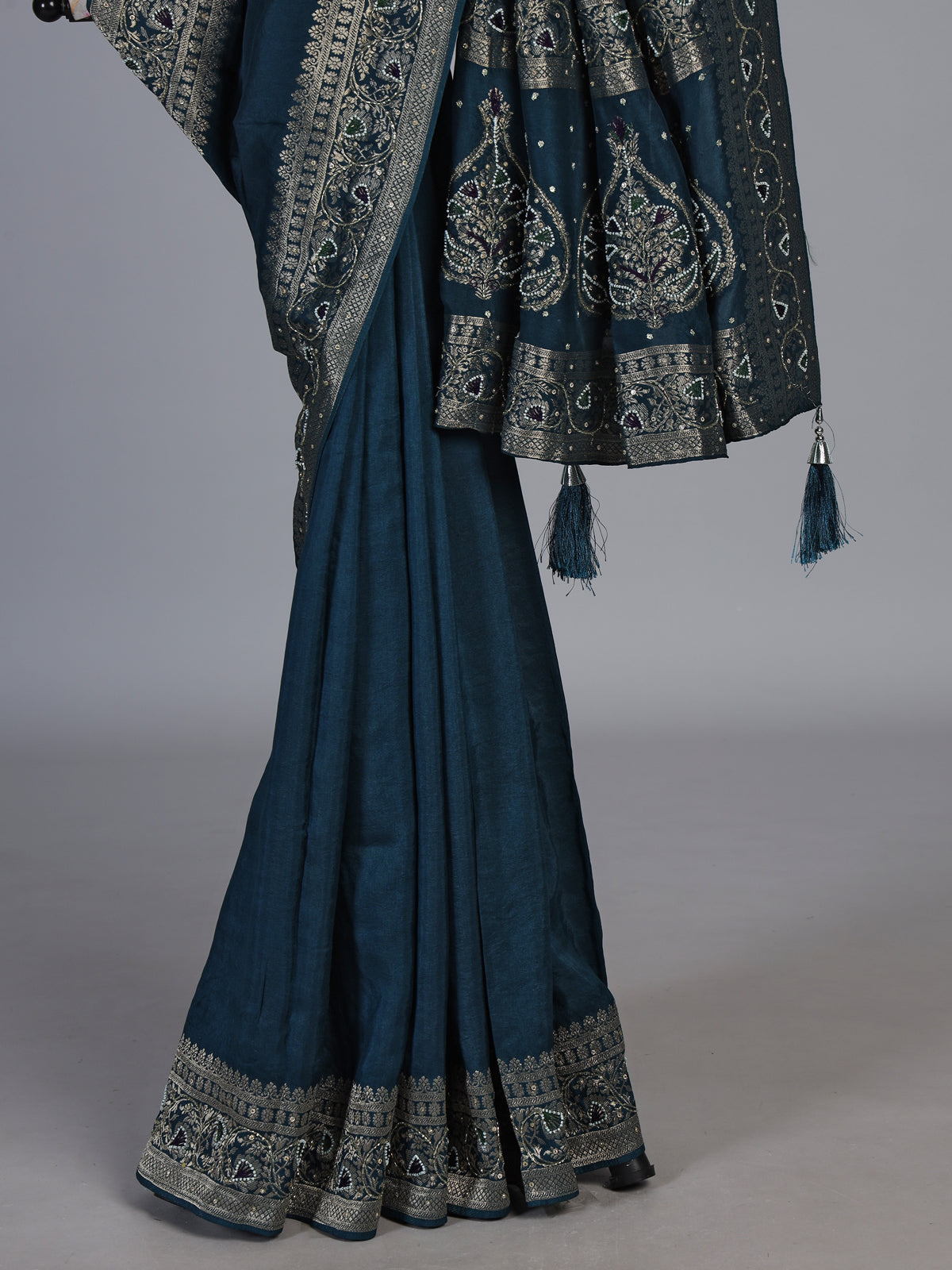 Teal blue dola silk saree with floral tassel designer work