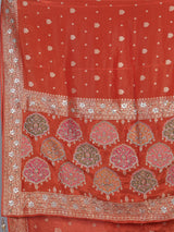 Rust orange dola silk saree with floral butti handwork