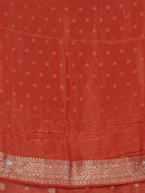 Rust orange dola silk saree with floral butti handwork