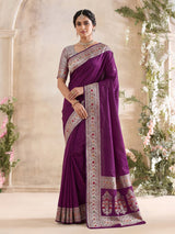 Purple paithani silk saree with elegant floral zari motifs