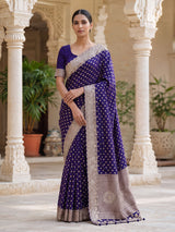Blue banarasi silk saree with elegant butti and handwork design