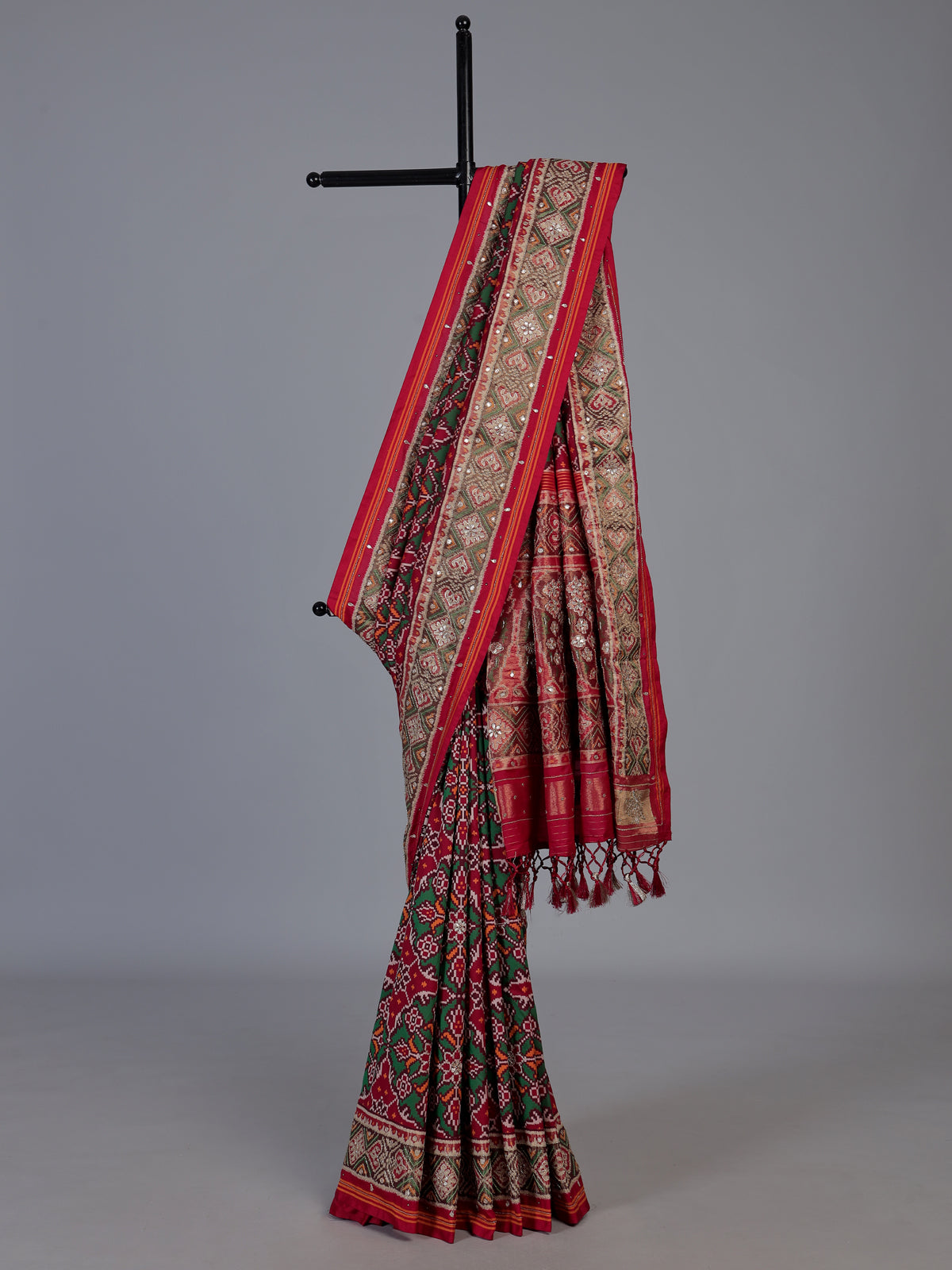 Maroon art patola silk saree with elegant traditional craftsmanship