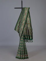 Green art patola silk saree with traditional motif handwork