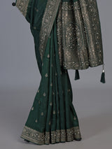 Green dola silk saree with rich butti elegance