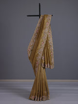 Gold tissue silk saree with bird motif border embellishments