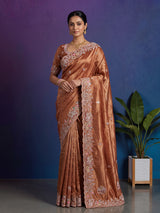 Pastel orange tissue silk saree with elephant border festive elegance