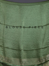 Pastel pista green shimmer dola silk saree with peacock motifs