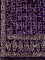 Purple dola silk bandhani saree with luxurious tassel pallu detailing