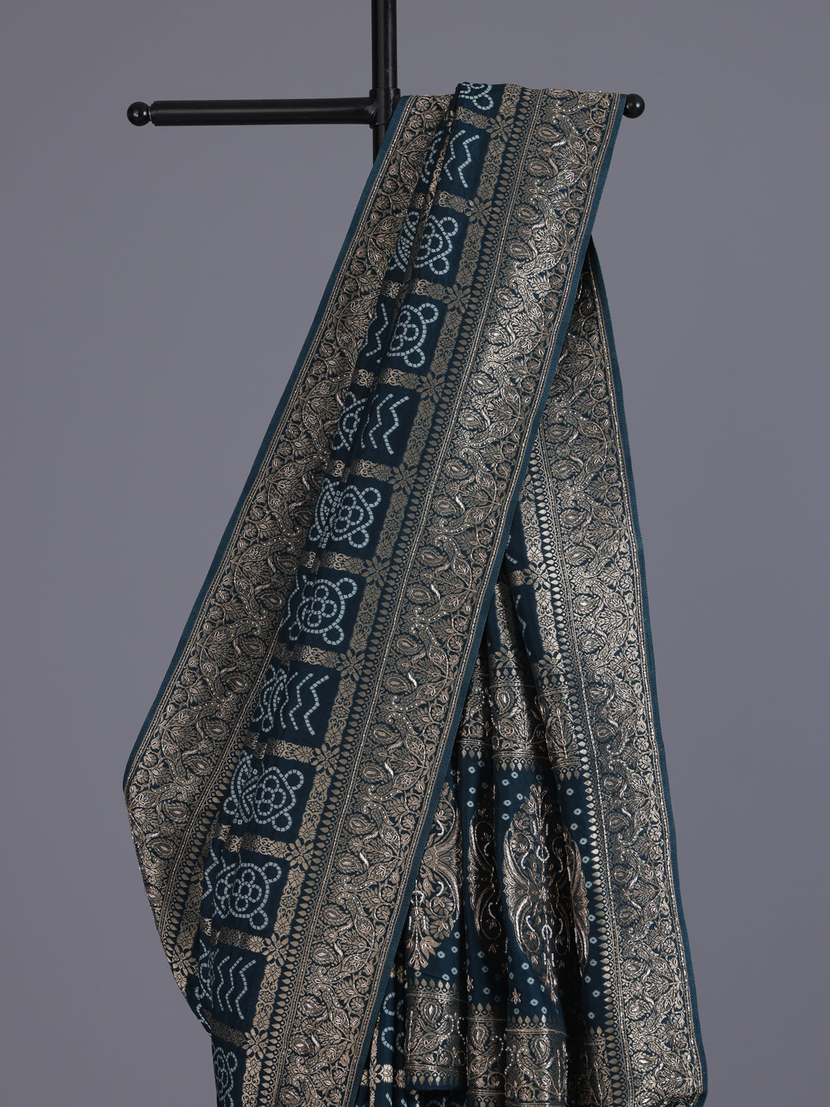 Peacock green dola silk bandhani saree with tassel pallu elegance