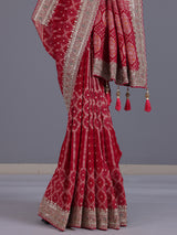 Rani pink semi georgette bandhani saree with festive tassel pallu