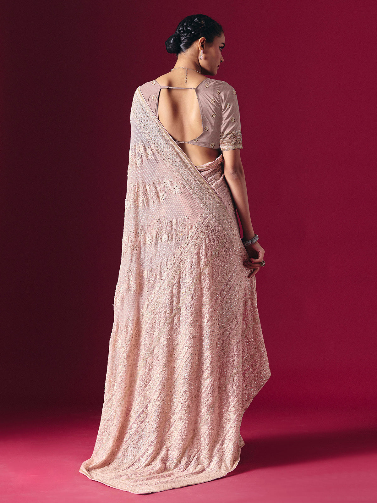 Blush pink Lucknowi georgette saree with elegant chikankari handcrafted detailing
