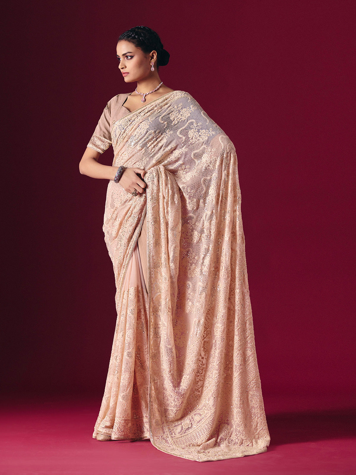 Light peach Lucknowi georgette saree with chikankari designer detailing
