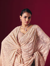 Light peach Lucknowi georgette saree with chikankari designer detailing