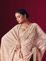 Light peach Lucknowi georgette saree with chikankari designer detailing