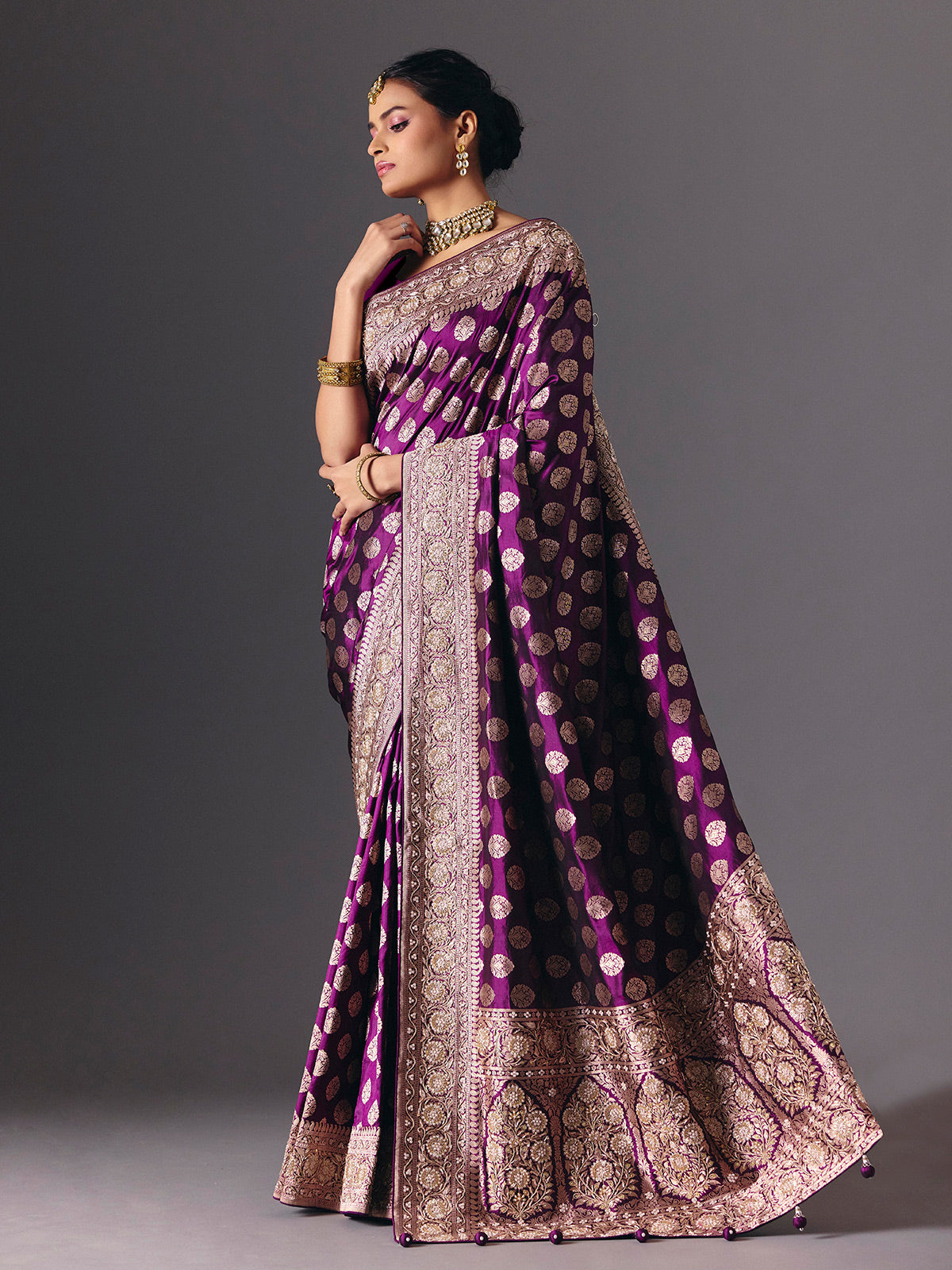Deep purple pure banarasi silk saree with regal bridal embellishments