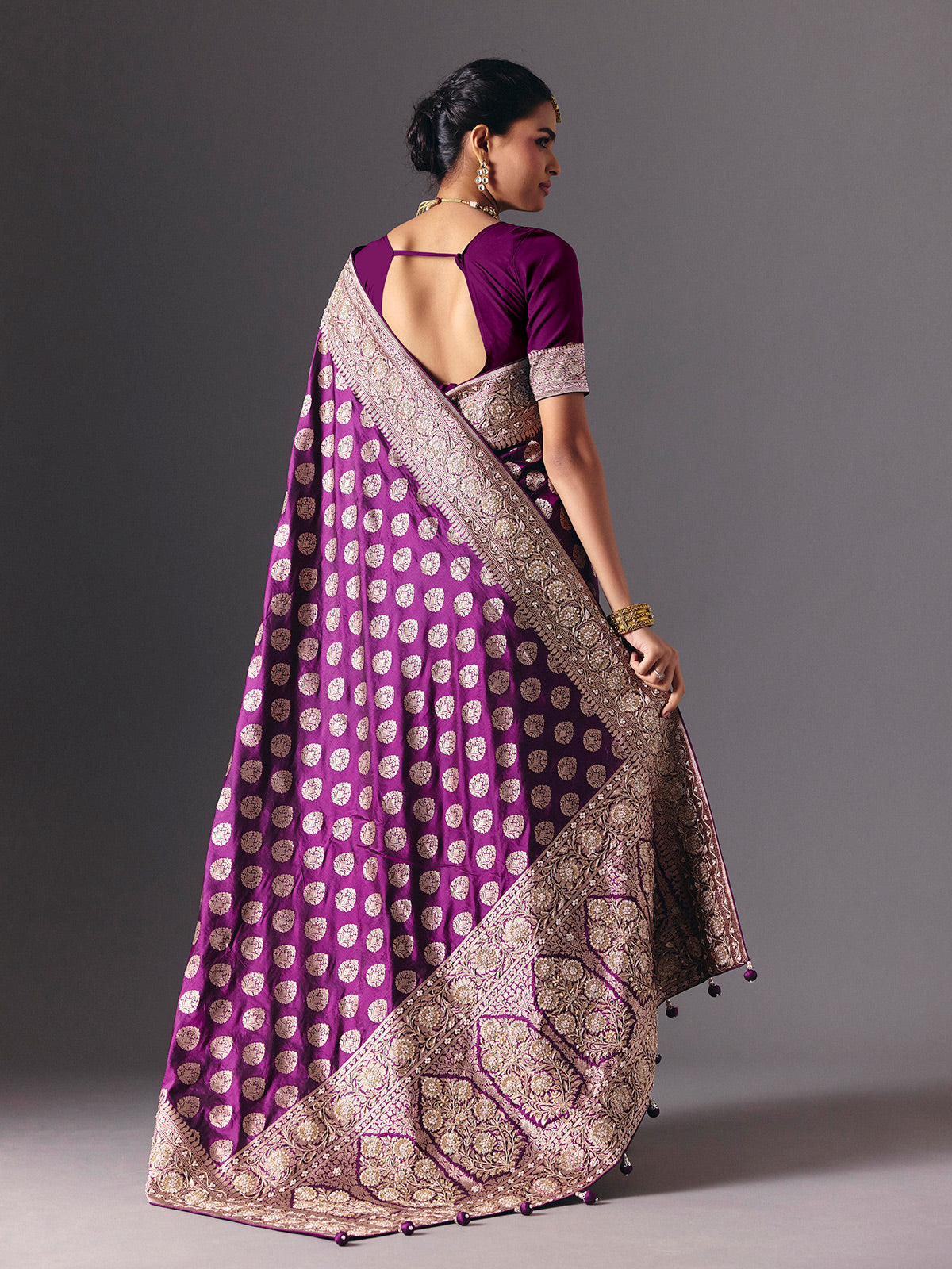 Deep purple pure banarasi silk saree with regal bridal embellishments