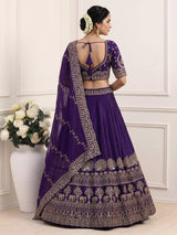 Royal purple raw silk elephant and peacock motif lehenga choli