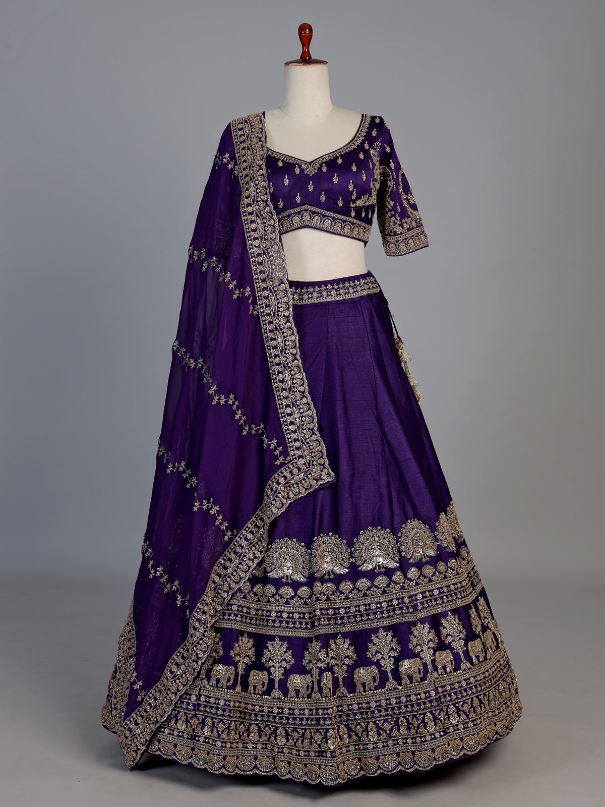 Royal purple raw silk elephant and peacock motif lehenga choli