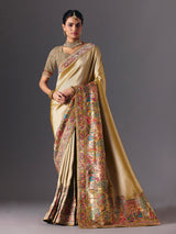 Gold tissue silk bridal saree with luxurious zardosi zari work
