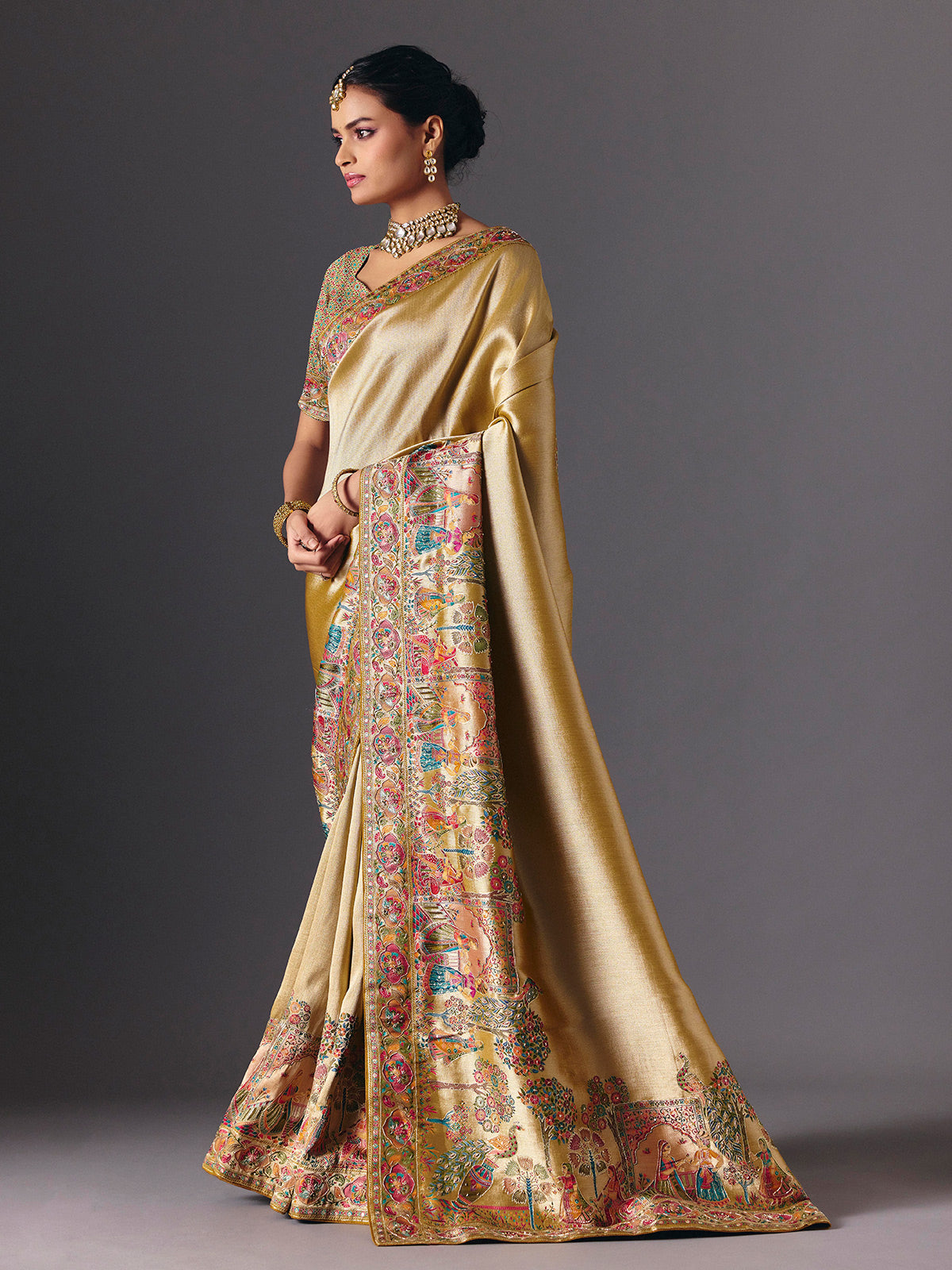 Gold tissue silk bridal saree with luxurious zardosi zari work