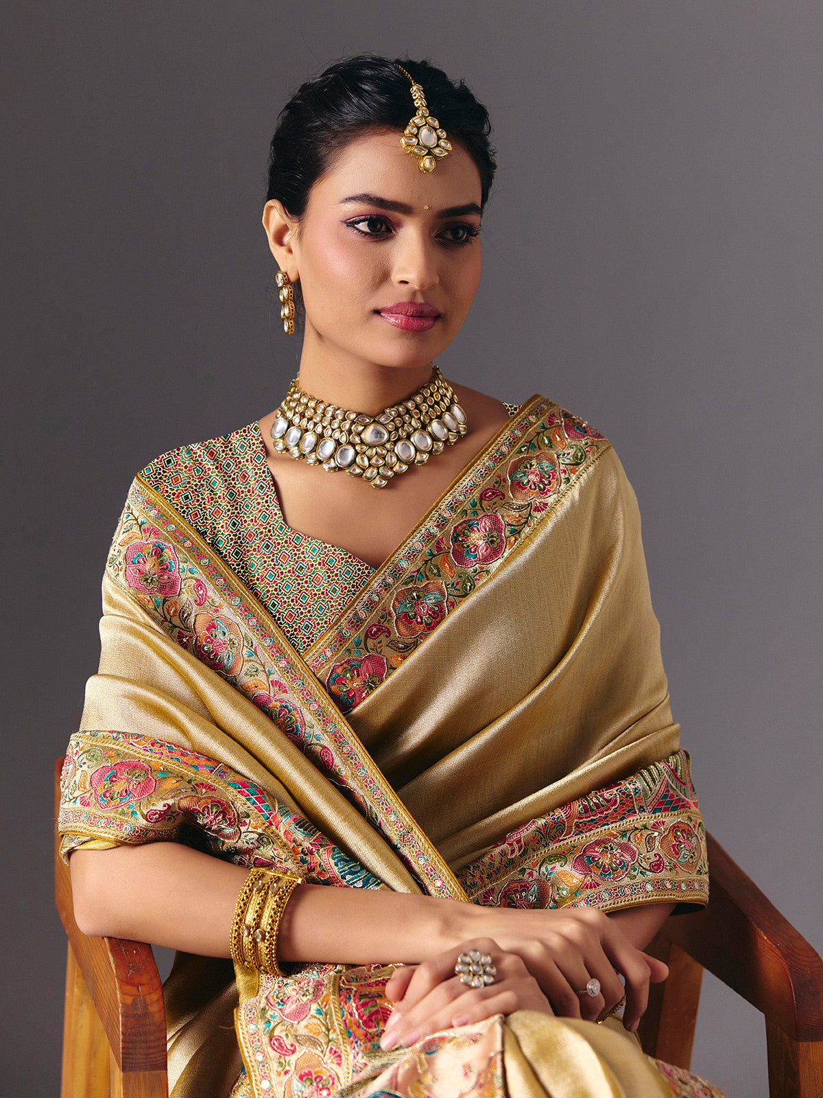 Gold tissue silk bridal saree with luxurious zardosi zari work