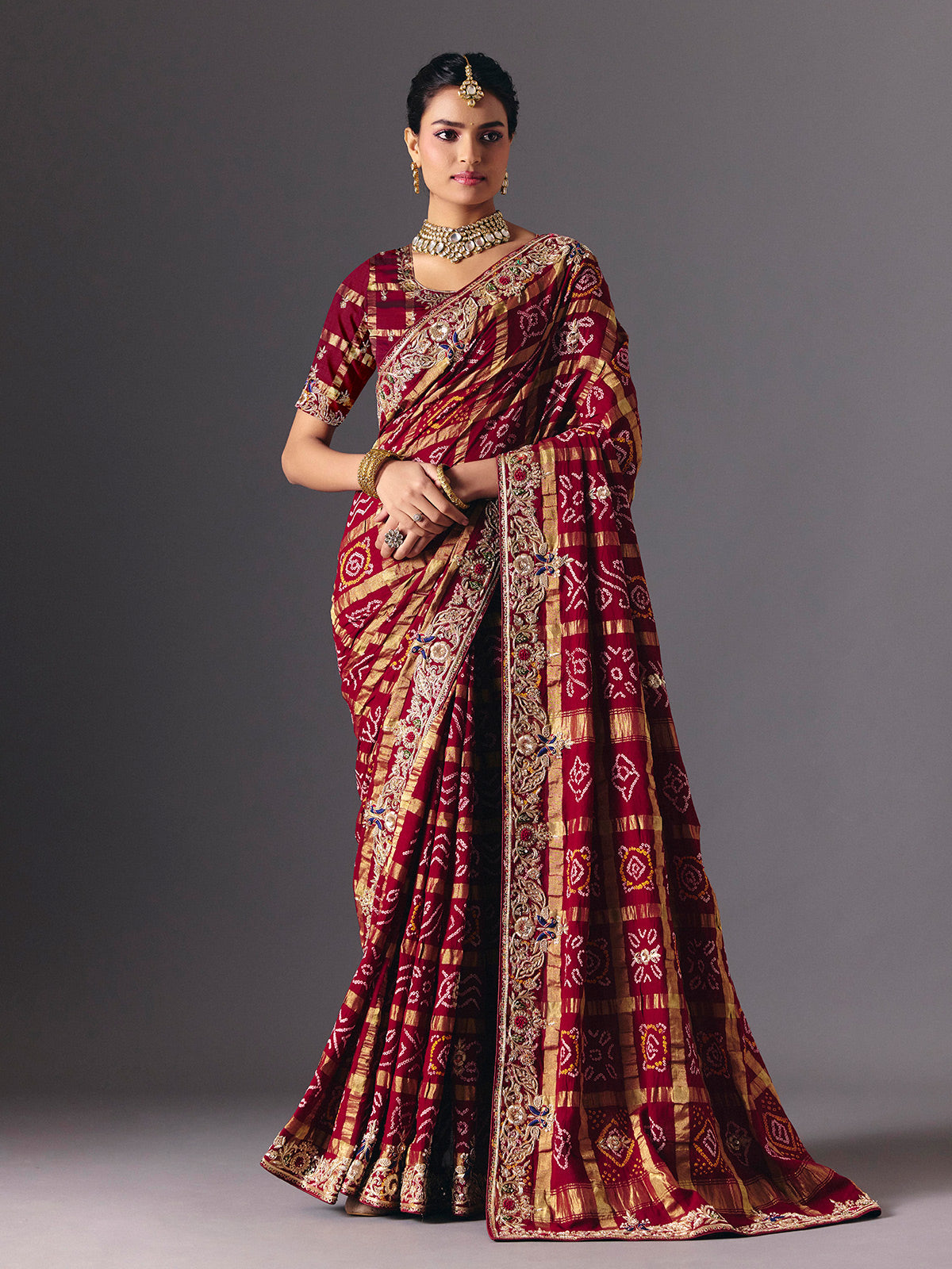 Maroon pure gharchola silk Bandhani saree with bridal zari elegance