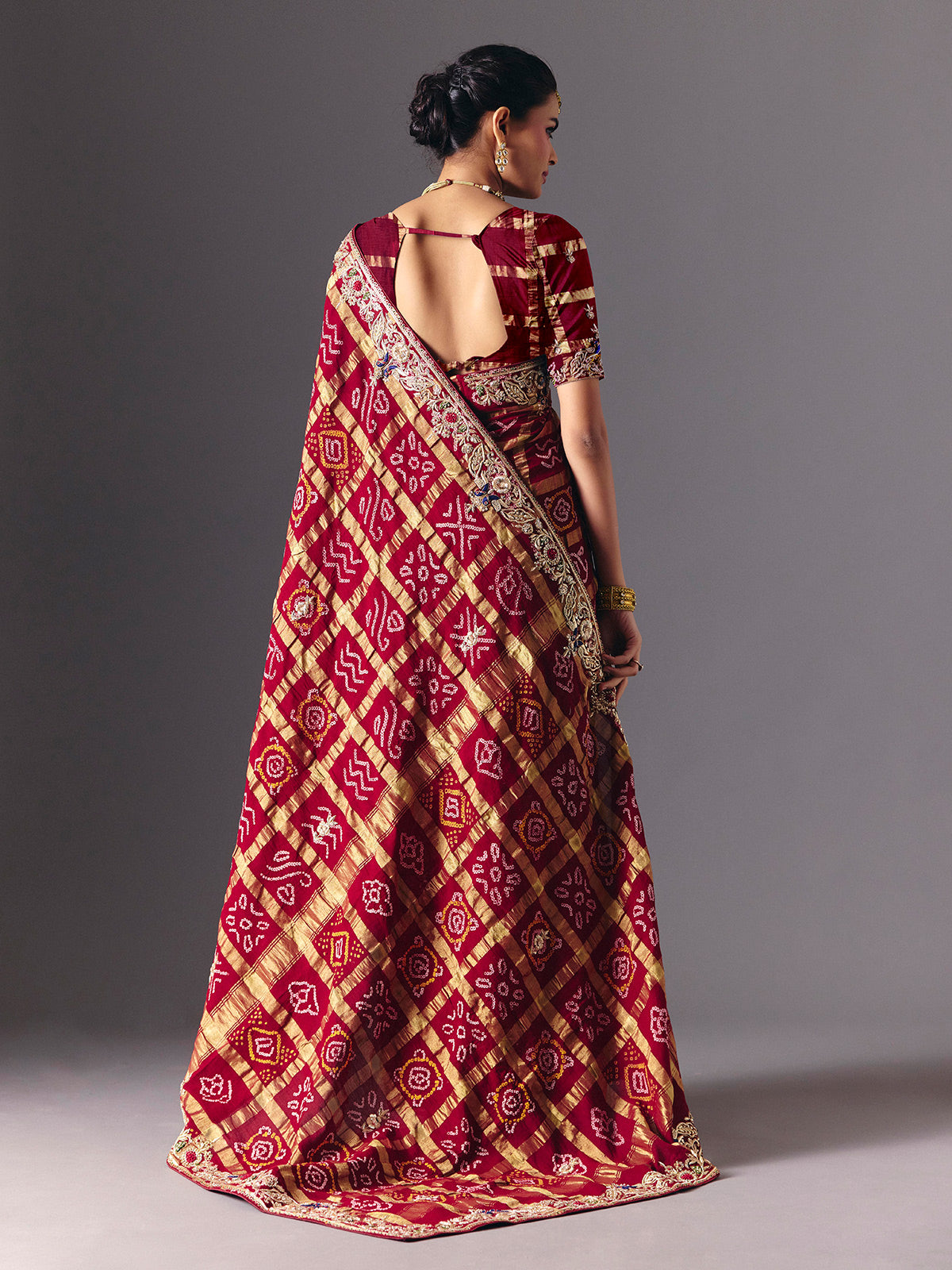 Maroon pure gharchola silk Bandhani saree with bridal zari elegance