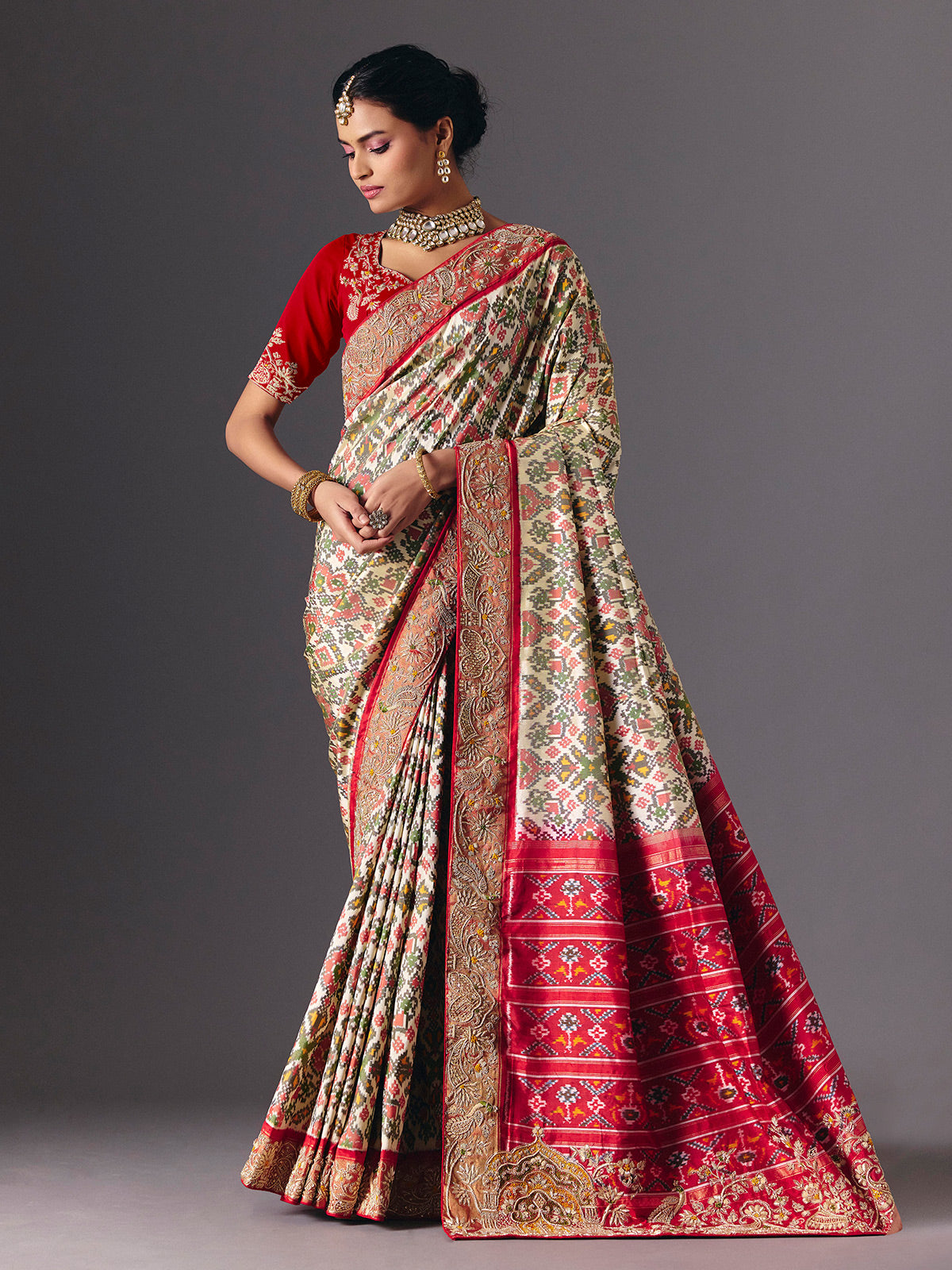 Cream Hyderabadi patola silk saree with elegant festive zari detailing