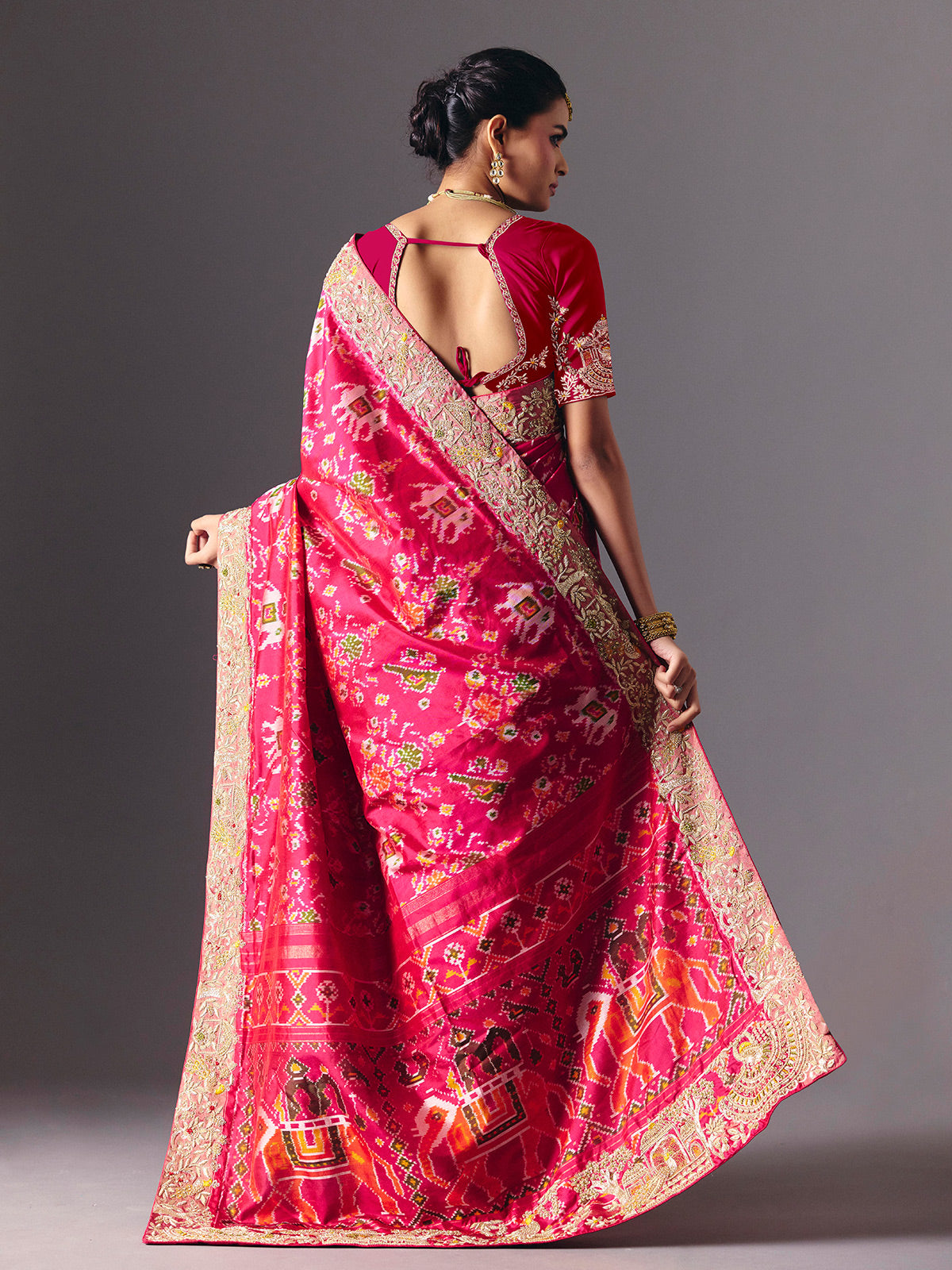 Rani pink Hyderabadi patola silk saree with designer zari embellishments