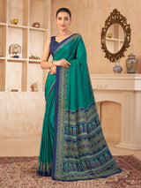 Peacock green printed contrast border crepe silk saree