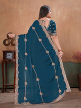 Peacock blue radiant embroidered satin saree with blouse