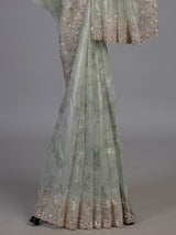Pista green floral sequin tissue silk saree