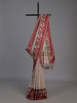 Beige and maroon art tusser silk saree with floral bird motifs