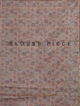 Beige art tusser silk saree with peacock floral motifs