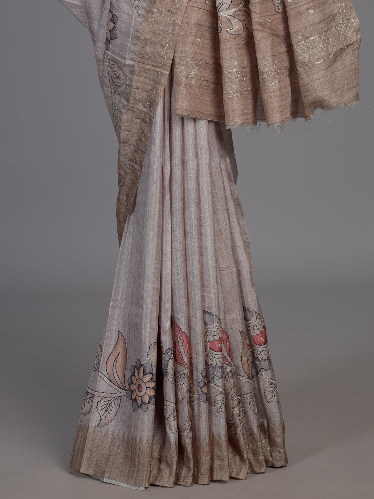 Beige art tusser silk saree with peacock floral motifs